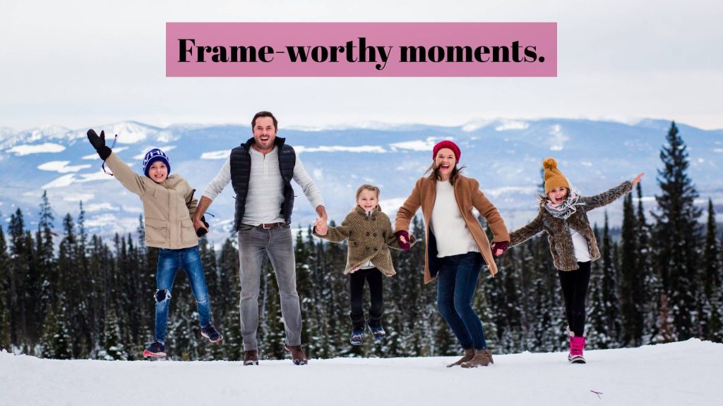 playful family enjoying the snow at big white